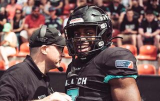 Running Back Tomiwa Oyewo